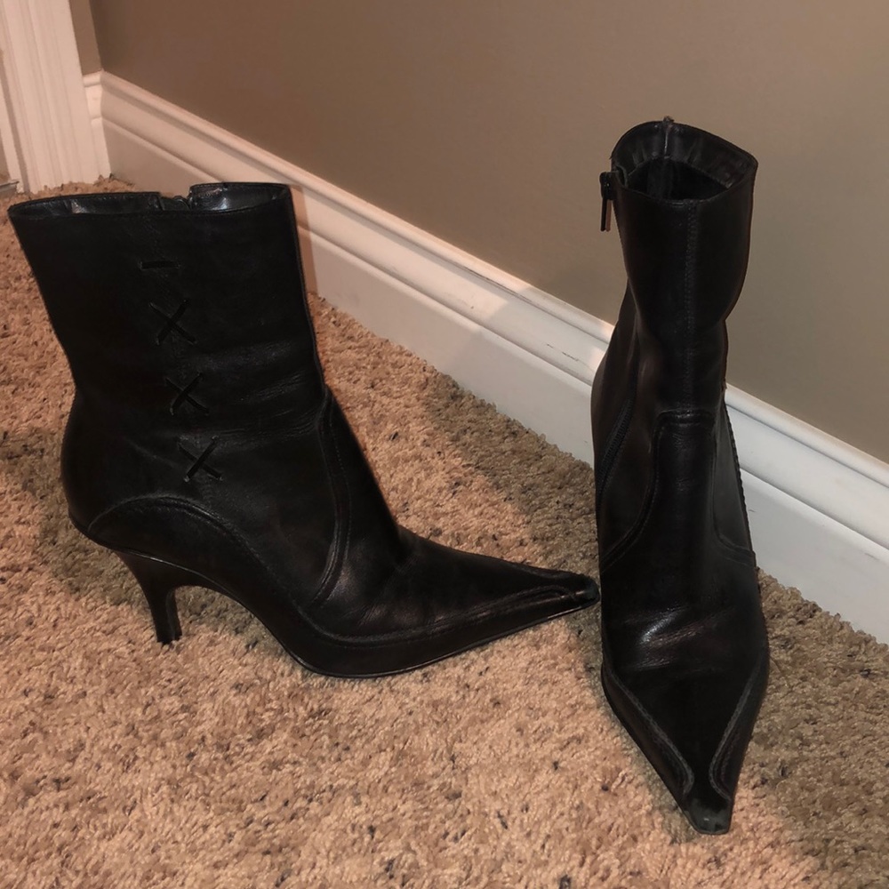 Black high heel boots size 8.5. Zip closure